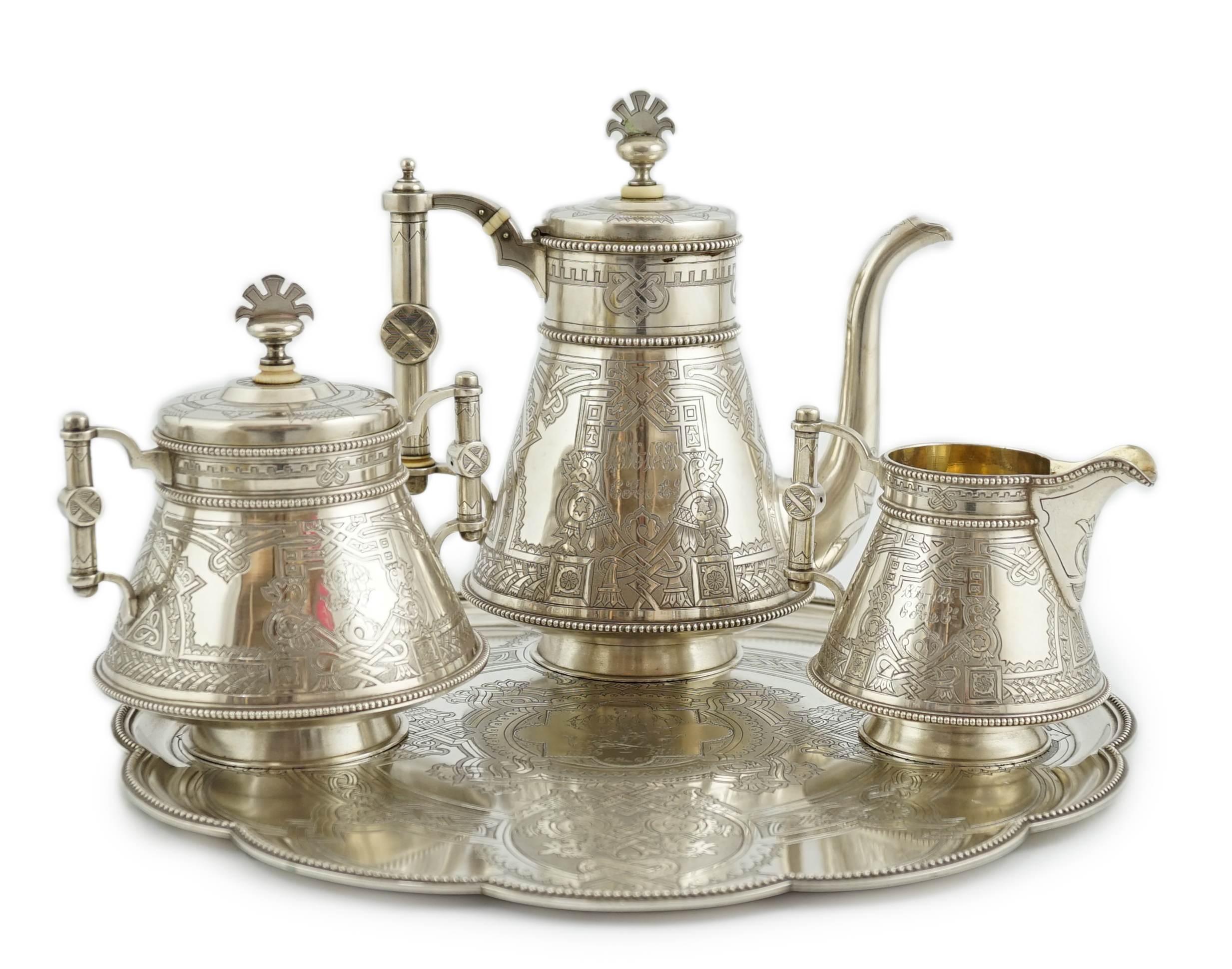 A late 19th century Russian three piece 84 zolotnik silver coffee set, with matching cusped circular tray, CITES submission reference: 6NJYTYTT